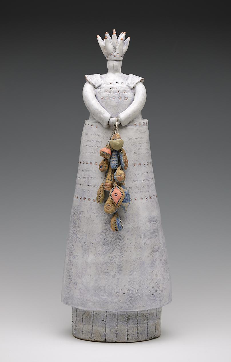 Crowned Figure with Beads