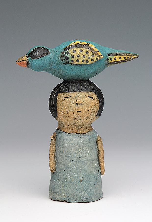 ceramic figure with bird by Sara Swink