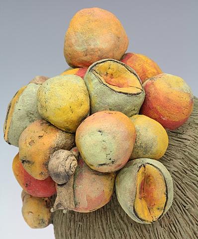 clay ceramic head with fruit and snails by sara swink